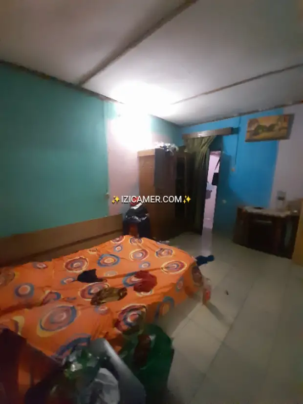 Maison a vendre a côté du goudron à akwa nord de l'axe principale de 4chambres 2douches | IZICAMER
